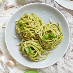 Spaghetti pasta with pesto sauce
