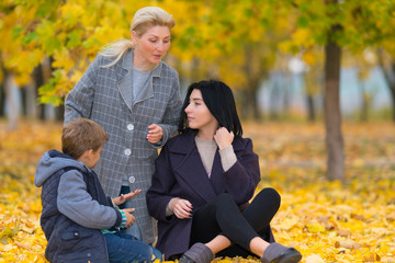 Young family in an autumn park