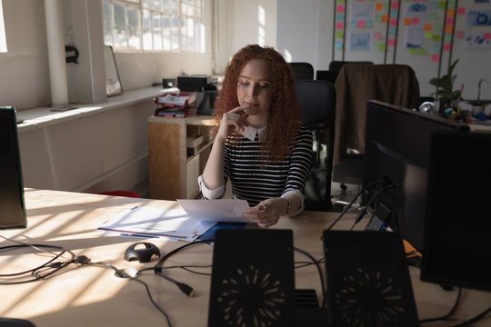 Female executive working at desk
