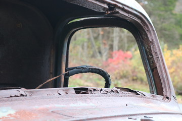 Fototapeta na wymiar Old rusty antique truck on roadside