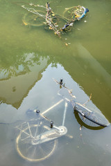biciclette in acqua