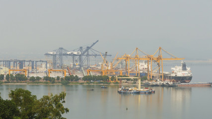 Cargo port in the work. Ha Long Bay. Vietnam.