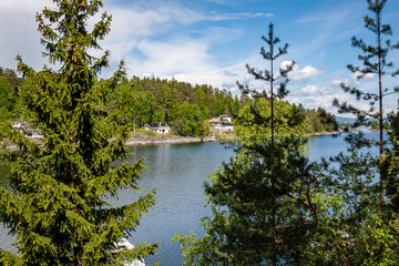 colorful sunset on the lake with water reflections and dramatic storm clouds above