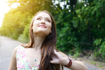 Fresh young beautiful woman. Portrait of girl summer outdoor, image toned.