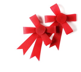 Red ribbon bow isolated on white background
