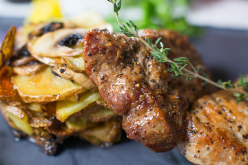 grilled meat and vegetables on plate