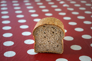 A half of bread, bread split in to two.