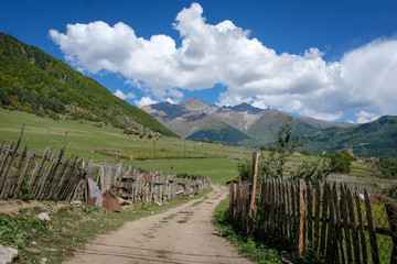 Peasant fields and pastures behind the fences  in the mountains