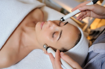 Lateral view of woman facial massage