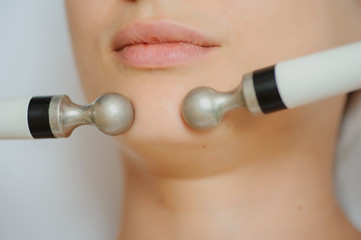 Top macro close up view of women facial massage spa procedure