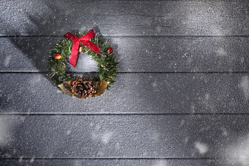 close up view of christmas and new year wreath on wooden back