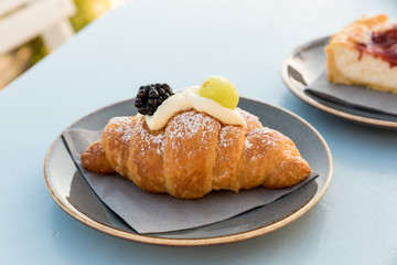 Creamy croissant with berries