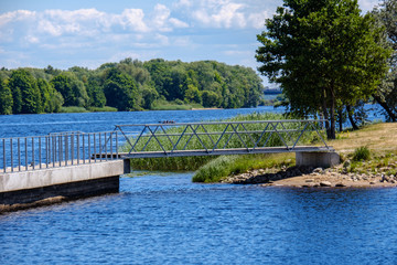 wooden and composite material foot bridge over water