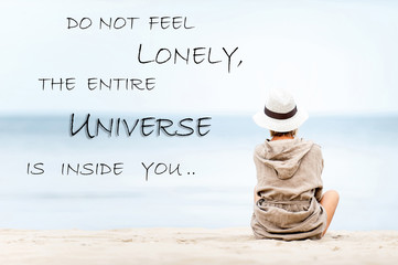 Do not feel lonely-universe inside you.Woman contemplating Sea