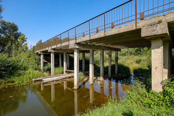 wooden and composite material foot bridge over water