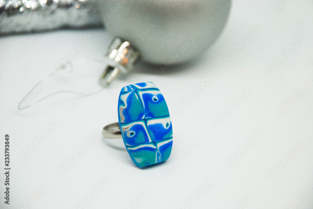 Wall mural winter handmade jewelry. blue and white abstract modern woman ring.