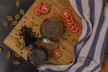 seasonings. pepper. a tomato