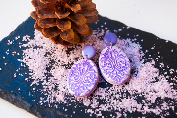 Bohemian style pink and white earrings in christmas decor. Oriental ornament. Polymer clay jewelry handmade.