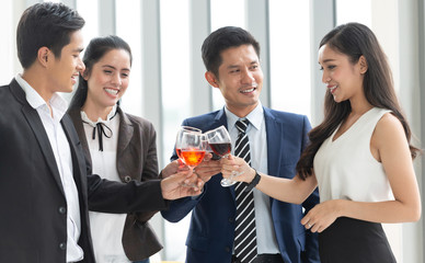 Group of Business People Toasting with red wine.