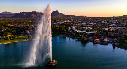 Aerial, drone view of the historic fountain at Fountain Hills Park in Arizona - Powered by Adobe