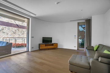 Interior of light spacious living room in a luxury villa