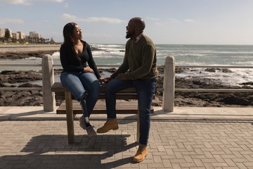 Couple interacting with each other on promenade