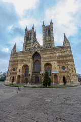 Fototapeta na wymiar The Lincoln Cathedral is a striking landmark in Lincolnshire, England, UK