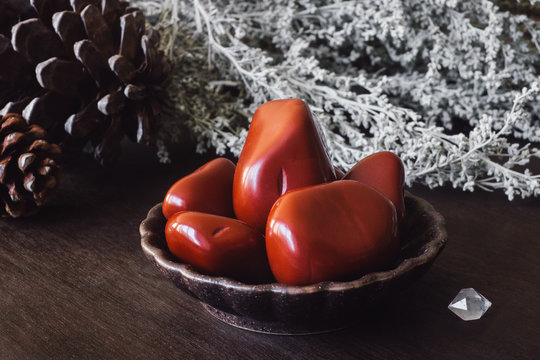 Red Jasper and Quartz Point with Dried Foliage and Pinecones