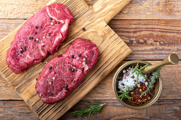 Hip beef steaks with seasonings