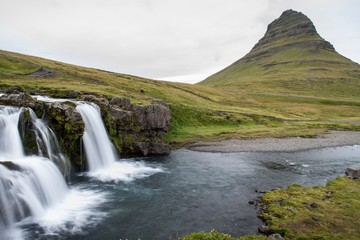 Waterfall and montain in iceland Kirkjufell