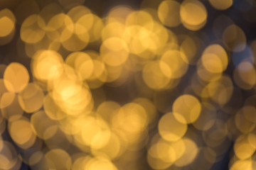 Bright  Abstract Blurred gold Background with Shimmering Glitter Holiday Bokeh. Christmas wallpaper...