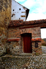 Courtyard of the medieval fortified saxon church in the village Crit-Kreutz, Transylvania, Romania