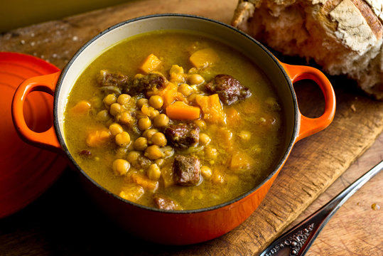 Lamb stew with chickpeas and butternut squash served in casserole