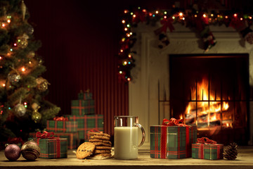 close up view of glass of milk with cookies on color back