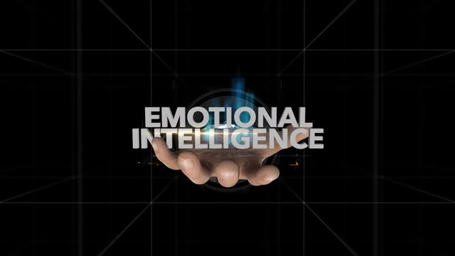 Hand Reveals Hologram Word-EMOTIONAL INTELLIGENCE