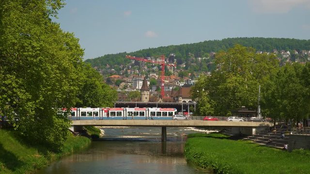 zurich city sunny day traffic bridge riverside panorama 4k switzerland
