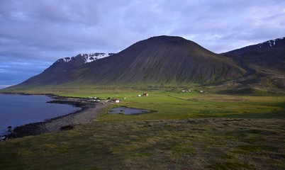 Icelandic landscape with the campsite at the hot pot Grettislaug on peninsula Skagi.