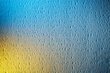 Soft yellow light on a blue background
