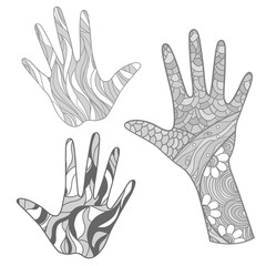 Hands with abstract colored patterns on isolation background. Design for spiritual relaxation for adults. Zen art. Doodles for banners, posters, t-shirts and textiles