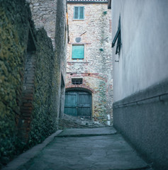 Colorful narrow streets in the medieval town of Campiglia Marittima in Tuscany with slide film photography - 1