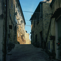 Colorful narrow streets in the medieval town of Campiglia Marittima in Tuscany with slide film photography - 2