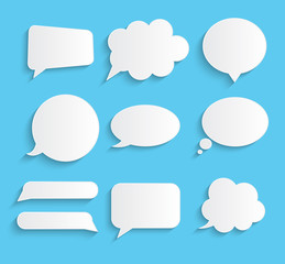 White blank retro speech bubbles set on blue background. Vector Illustration