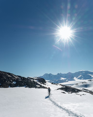 hiker at an alpine pass