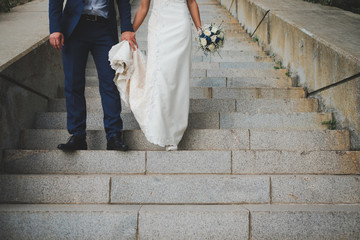 Bride and groom on steps