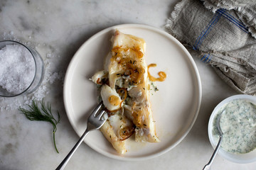 Close up of cod fish served on plate 