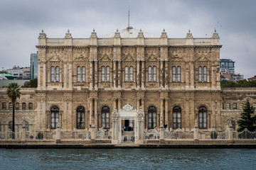 Dolmabahce Palace from the Bosporus with crowds of people in front of it
