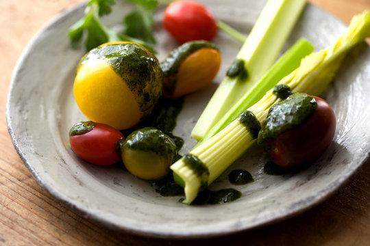 Close up of crudites with cilantro cumin dip served in plate