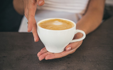 barista propose americano or espresso cup. relax in cafe or coffee shop and drinking. perfect morning with best coffee. fresh morning coffee with milk and cream froth. Five minutes for coffee