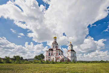 Two-tier Church on the background of the summer field 1829.