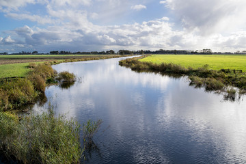 Fototapeta na wymiar Dutch polder landscape in the province of Friesland